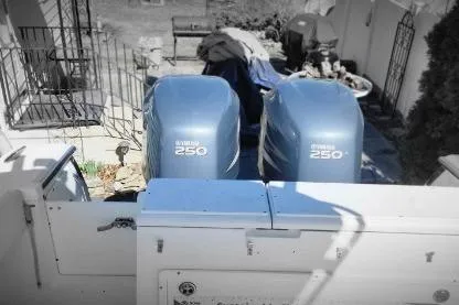 Slide: The Image of Twin Yamaha 250 engines on a 2006 Southport 26 Center Console boat. - 4