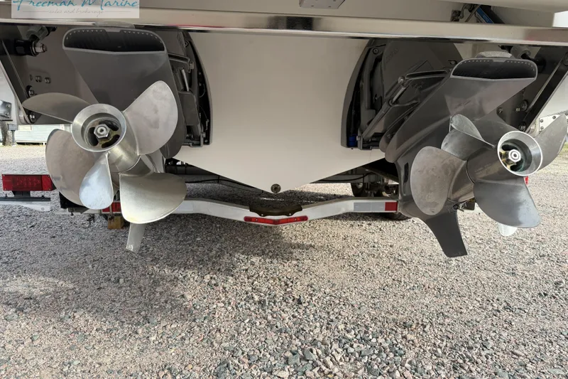 Slide: The Image of 2021 Cobalt R30 boat propellers on a trailer, showcasing dual outboard engines. - 11
