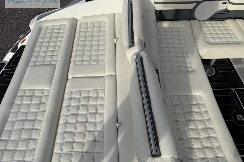 Slide: The Image of 2021 Cobalt R30 boat with luxurious white quilted seating. - 18