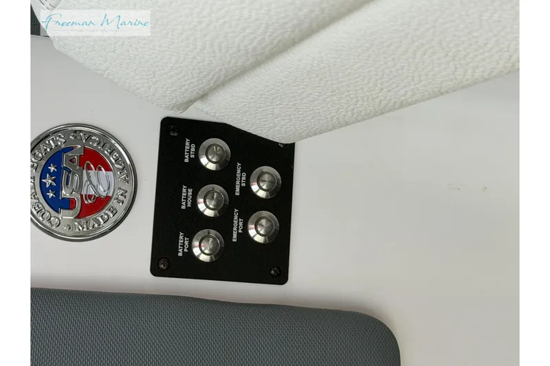 Slide: The Image of Control panel on 2021 Cobalt R30 boat with Freeman Marine branding. - 25