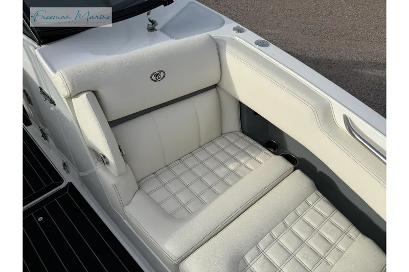 Slide: The Image of Luxurious seating on a 2021 Cobalt R30 boat with elegant white upholstery. - 33