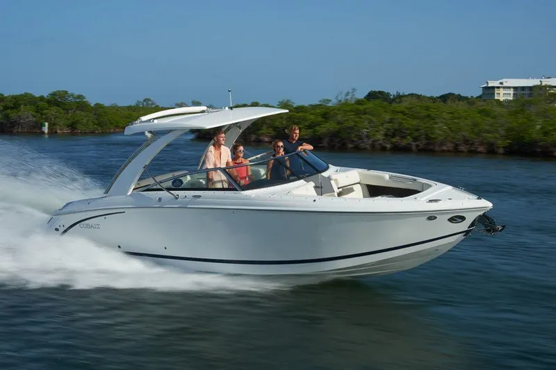 Slide: The Image of Manufacturer Provided Image: 2021 Cobalt R30 boat cruising on water with passengers. - 37