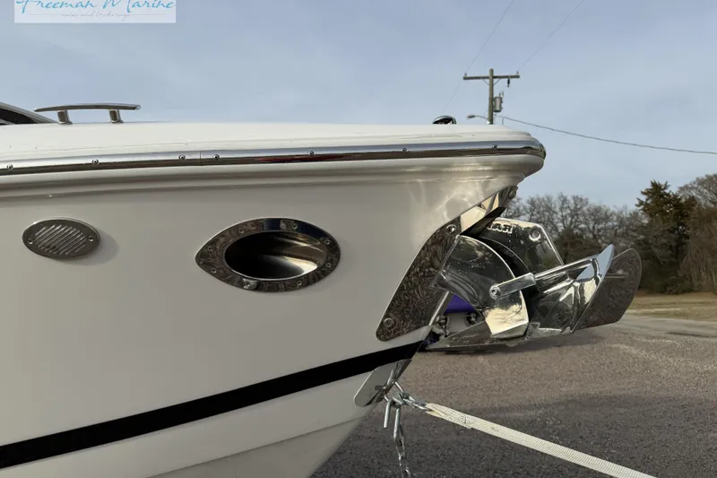 Slide: The Image of Close-up of 2021 Cobalt R30 boat's bow with anchor and chrome details. - 6