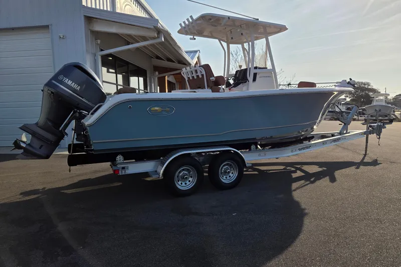 Slide: The Image of 2019 Sea Hunt Ultra 234 boat on trailer with Yamaha outboard motor. - 2
