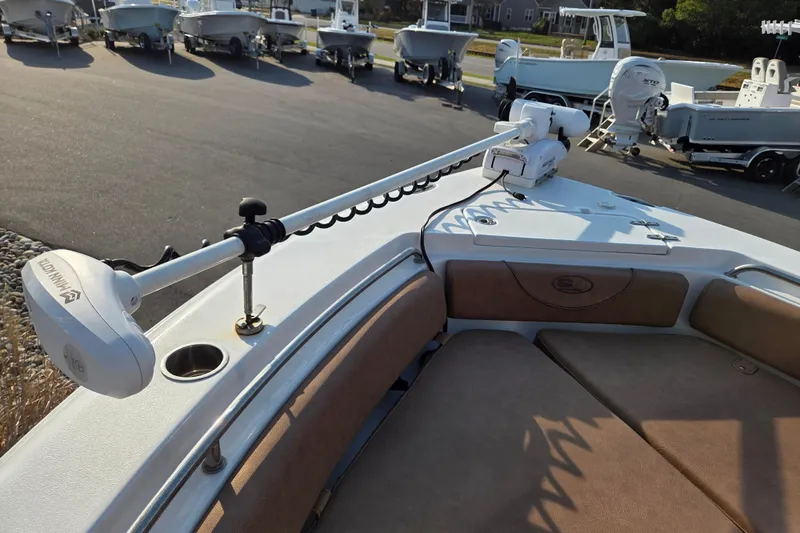 Slide: The Image of 2019 Sea Hunt Ultra 234 boat with Minn Kota trolling motor on deck. - 7
