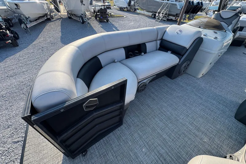 Slide: The Image of 2018 South Bay 725RS boat interior with plush seating and modern design. - 18