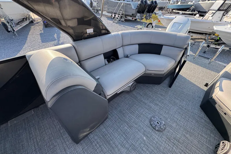 Slide: The Image of 2018 South Bay 725RS pontoon boat with gray seating and carpeted deck. - 27