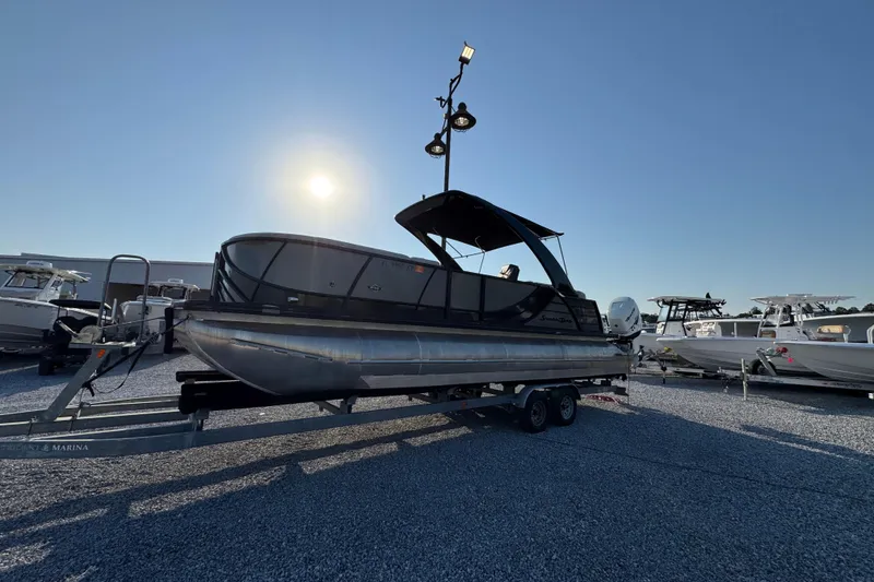 Slide: The Image of 2018 South Bay 725RS pontoon boat on trailer under clear sky. - 3