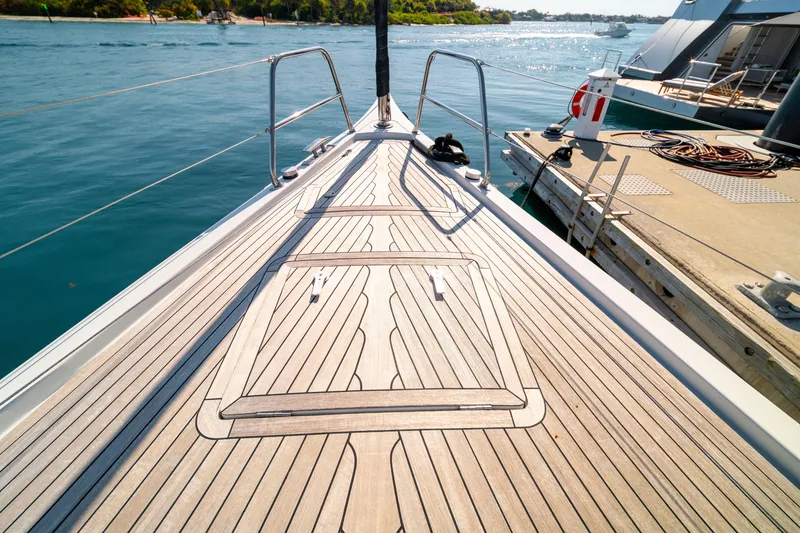 Slide: The Image of Grand Soleil 58 yacht deck, 2016 model, docked by the water. - 12