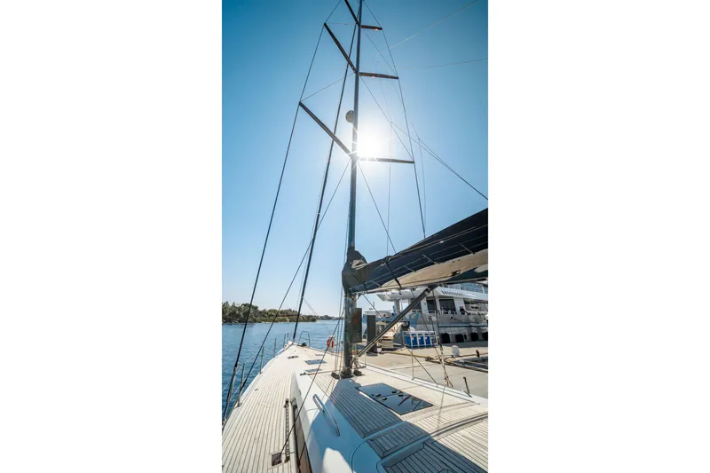 Slide: The Image of Sailing yacht Grand Soleil 58, 2016 model, docked under clear blue sky. - 17