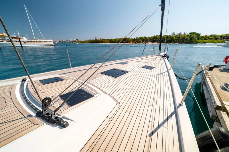 Slide: The Image of Deck view of 2016 Grand Soleil 58 yacht docked by the water. - 19