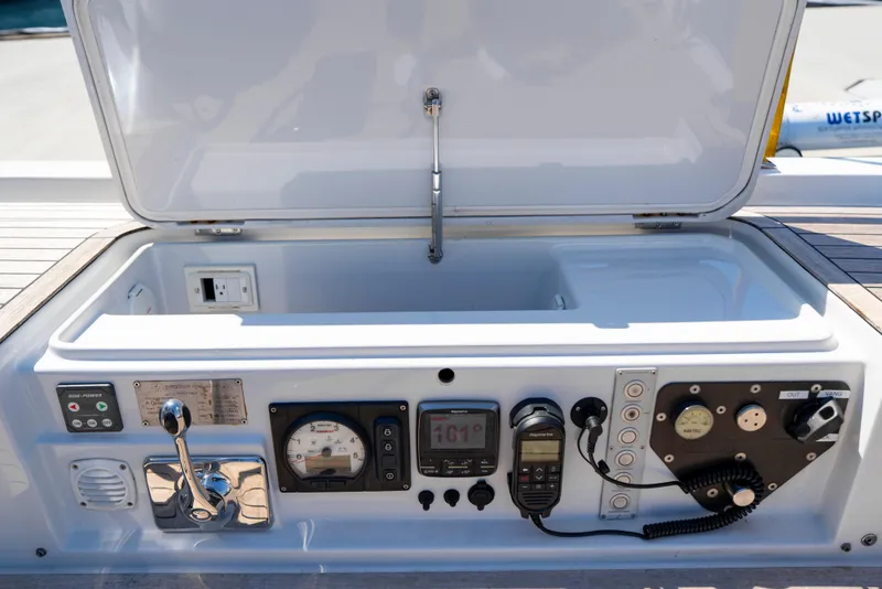 Slide: The Image of Control panel of a 2016 Grand Soleil 58 yacht, featuring navigation and communication instruments. - 25