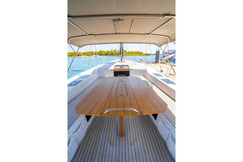 Slide: The Image of Spacious deck of 2016 Grand Soleil 58 yacht with wooden table and canopy. - 32