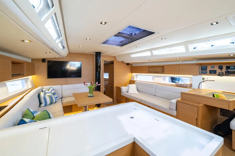 Slide: The Image of Luxurious interior of 2016 Grand Soleil 58 yacht with modern furnishings and ample natural light. - 36