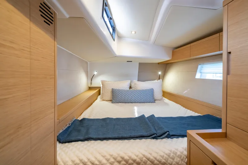 Slide: The Image of Luxurious cabin interior of 2016 Grand Soleil 58 yacht with cozy bedding and modern design. - 39