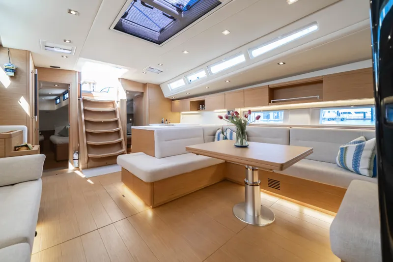Slide: The Image of Luxurious interior of 2016 Grand Soleil 58 yacht with modern seating and dining area. - 45