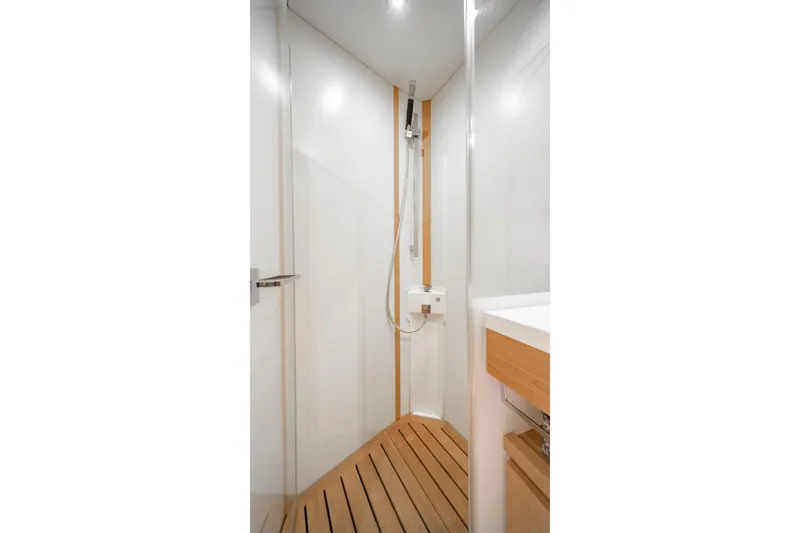 Slide: The Image of Modern shower area in 2016 Grand Soleil 58 yacht with wooden flooring. - 50