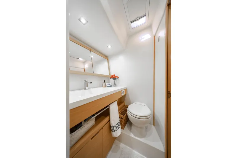 Slide: The Image of Luxurious bathroom interior of 2016 Grand Soleil 58 yacht, featuring modern fixtures and elegant design. - 54
