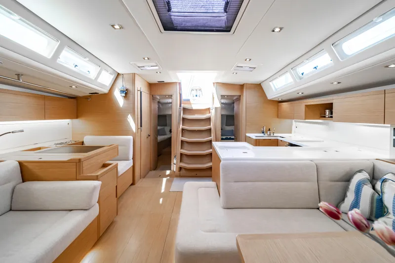 Slide: The Image of Luxurious interior of 2016 Grand Soleil 58 yacht with modern design and ample natural light. - 60
