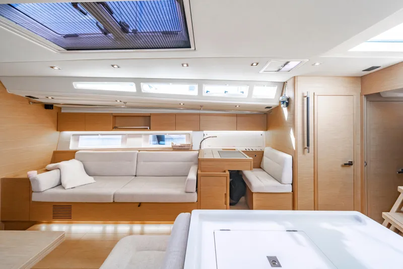 Slide: The Image of Luxurious interior of 2016 Grand Soleil 58 yacht with modern furnishings and ample natural light. - 61