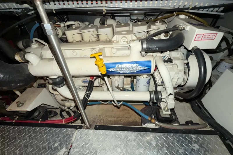 Slide: The Image of Engine compartment of a 2001 Carver 444 Cockpit Motor Yacht, featuring Diamond Performance Series engine. - 23