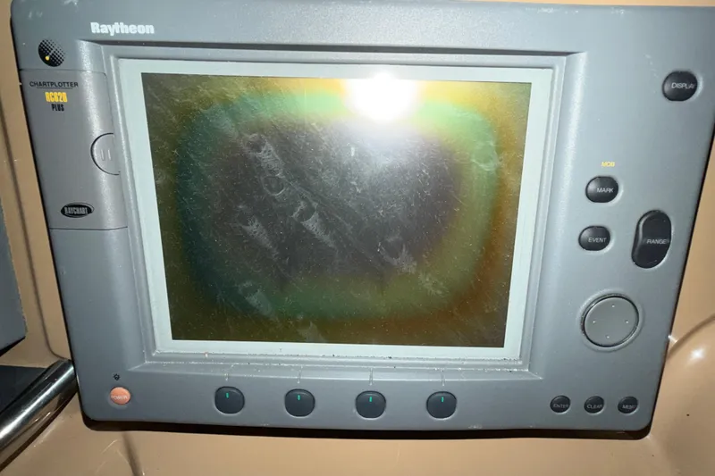 Slide: The Image of Raytheon chartplotter display on 2001 Carver 444 Cockpit Motor Yacht. - 31