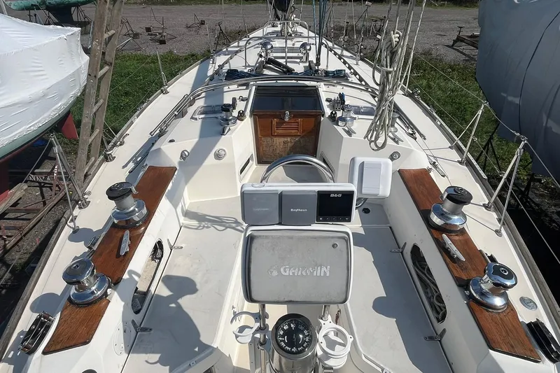 Slide: The Image of Cockpit of a 1987 Sabre 42 sailboat with navigation equipment and winches. - 9