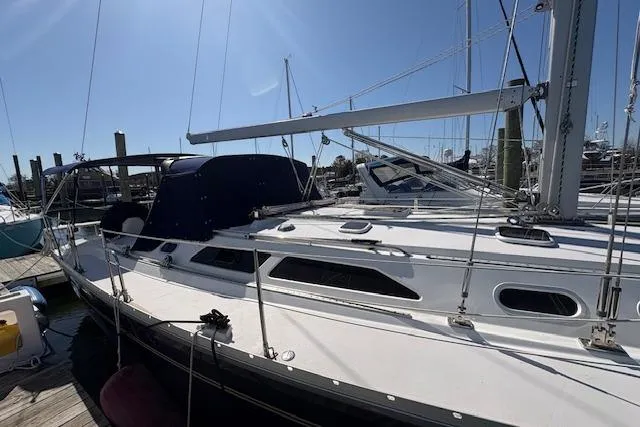 Slide: The Image of Catalina 400 MkII 2002 sailboat docked under clear blue sky. - 14