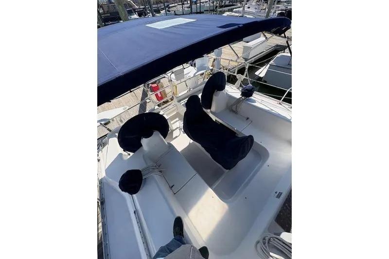 Slide: The Image of Cockpit of 2002 Catalina 400 MkII sailboat with blue canopy and seating. - 18