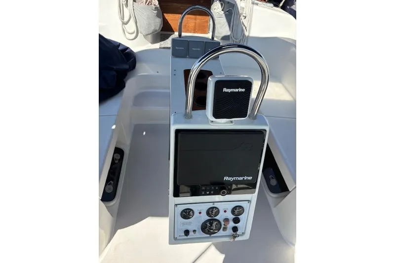 Slide: The Image of Cockpit controls of a 2002 Catalina 400 MkII sailboat with Raymarine equipment. - 19