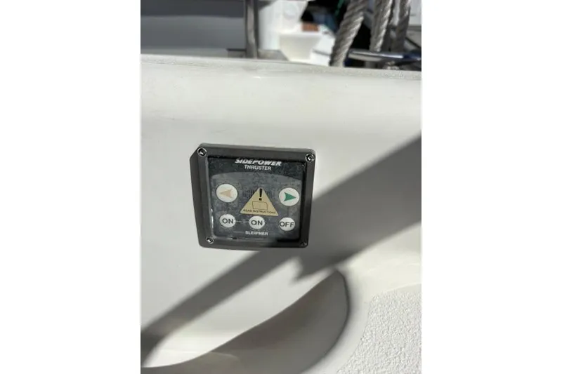 Slide: The Image of Control panel of a 2002 Catalina 400 MkII sailboat, featuring Side-Power thruster controls. - 20