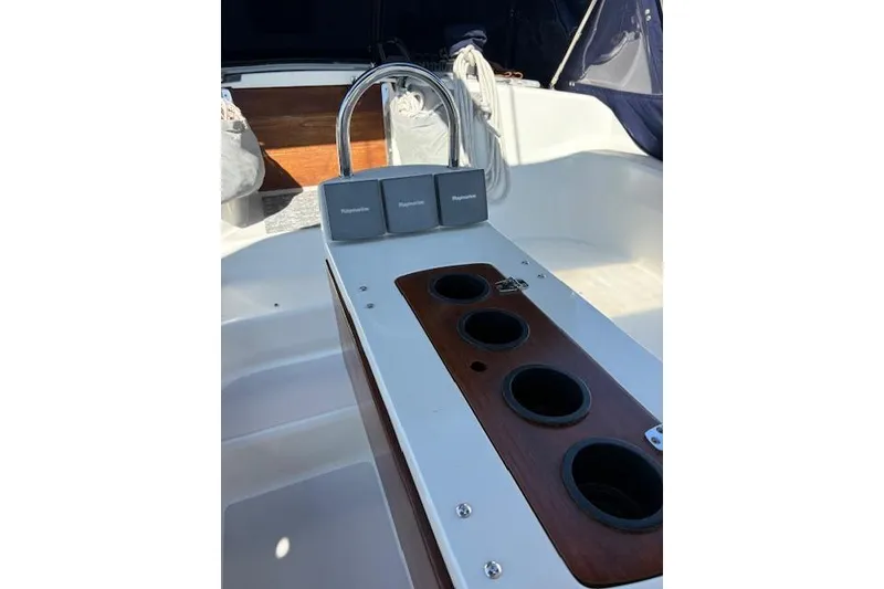 Slide: The Image of Cockpit of 2002 Catalina 400 MkII sailboat with cup holders and navigation instruments. - 21