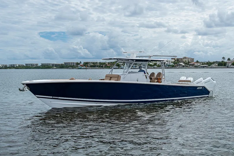 Slide: The Image of 2024 Jupiter 43 boat on water, featuring sleek design and modern amenities. - 10