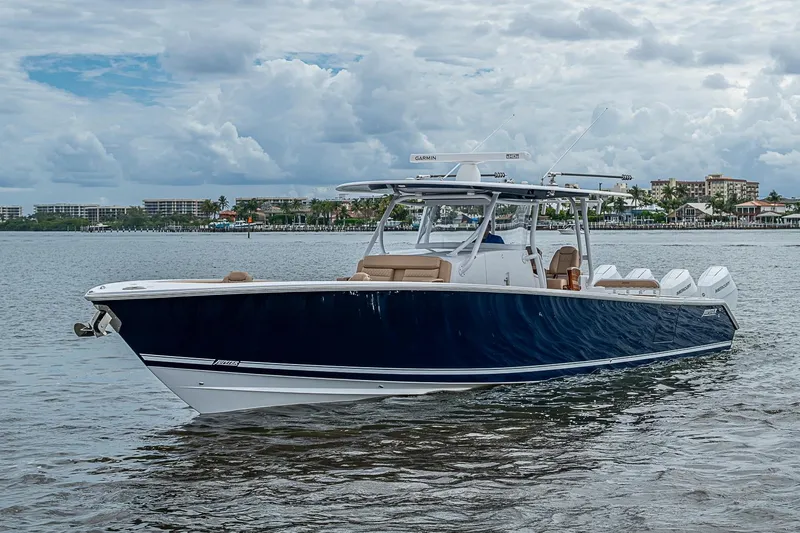 Slide: The Image of 2024 Jupiter 43 boat on water, featuring sleek design and modern amenities. - 11