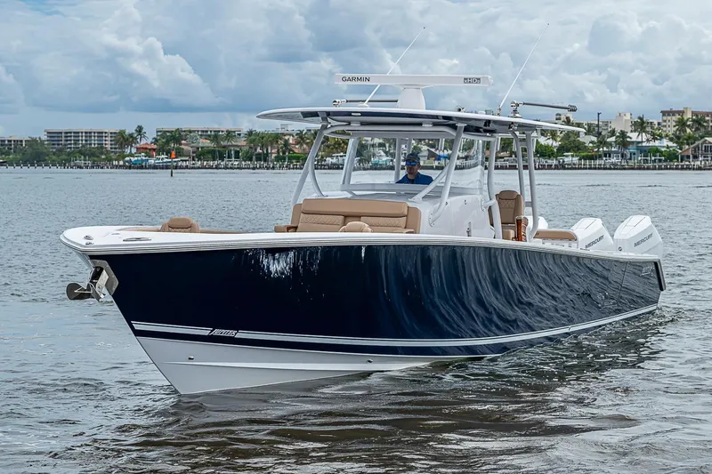 Slide: The Image of 2024 Jupiter 43 boat cruising on water, featuring sleek design and modern amenities. - 12