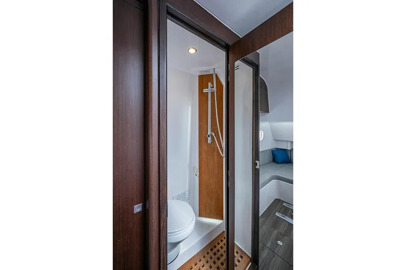 Slide: The Image of Luxurious bathroom interior of 2024 Jupiter 43 yacht with modern shower and toilet. - 24