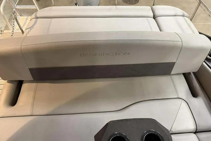 Slide: The Image of 2021 Bennington 20 LSB boat seat with cup holders, showcasing luxury design and comfort. - 12