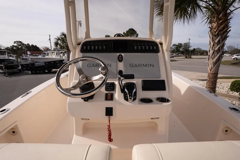 Slide: The Image of 2024 Grady-White 251 Coastal Explorer boat helm with Garmin electronics. - 20