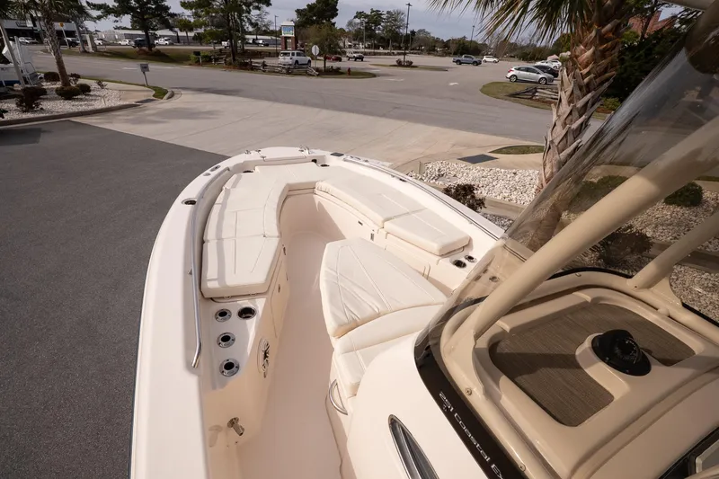 Slide: The Image of 2024 Grady-White 251 Coastal Explorer boat with spacious seating and sleek design. - 26