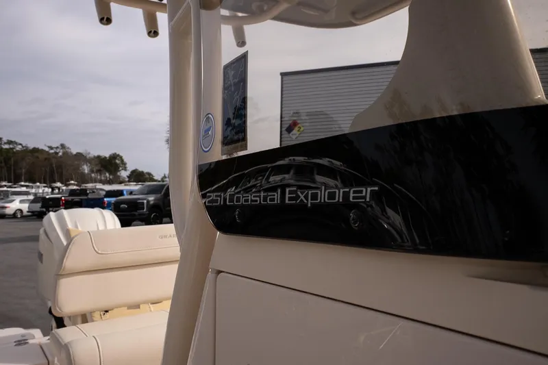 Slide: The Image of 2024 Grady-White 251 Coastal Explorer boat interior with logo detail. - 31