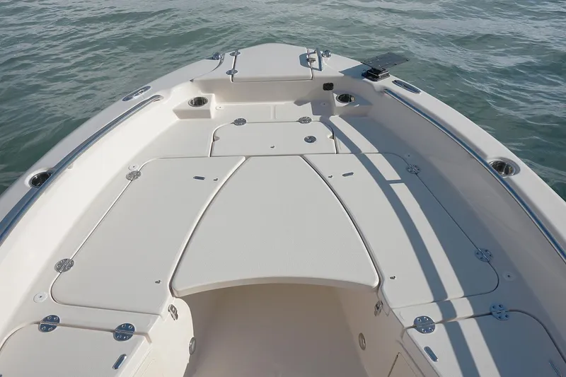 Slide: The Image of Manufacturer Provided Image: 2024 Grady-White 251 Coastal Explorer boat deck with storage compartments. - 4