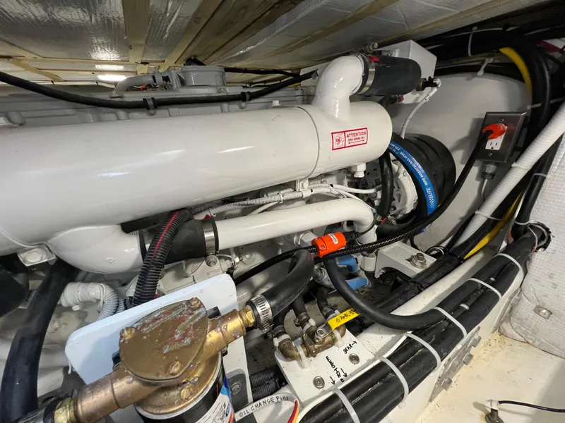 Slide: The Image of Engine room of 2022 Wesmac 38 boat, showcasing detailed mechanical components. - 48