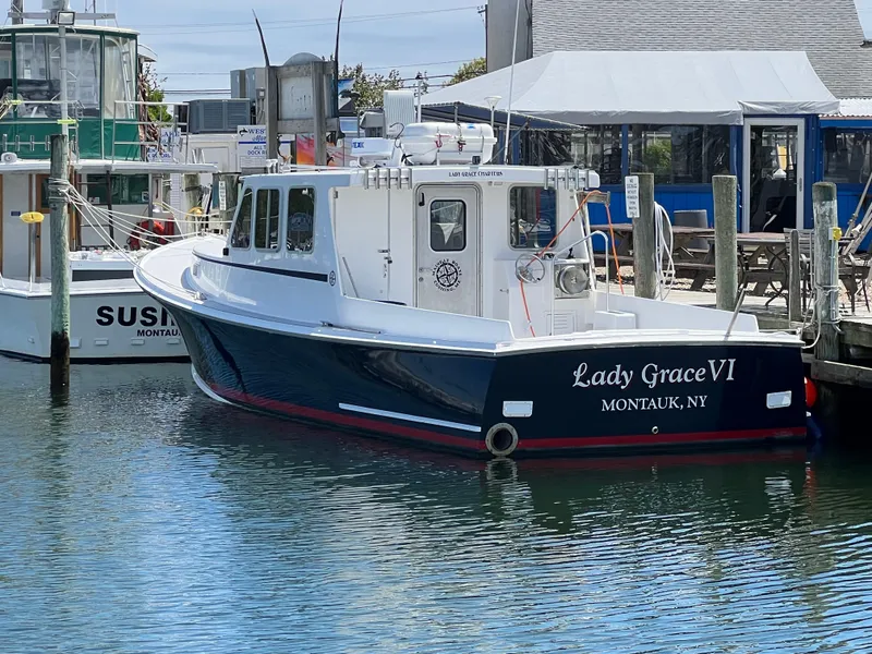 Slide: The Image of 2022 Wesmac 38 boat "Lady Grace VI" docked in Montauk, NY marina. - 7