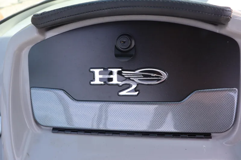 Slide: The Image of 2017 Chaparral 21 H2O Sport dashboard emblem close-up. - 20