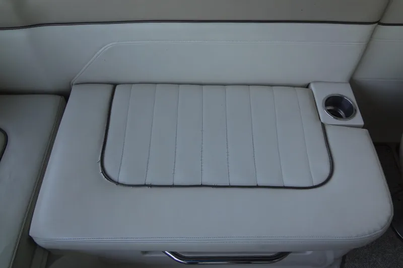Slide: The Image of 2010 Sea Ray 260 Sundeck boat seat with integrated cup holder. - 27
