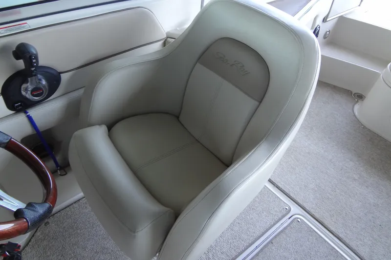 Slide: The Image of Captain's chair in 2010 Sea Ray 260 Sundeck boat interior. - 37