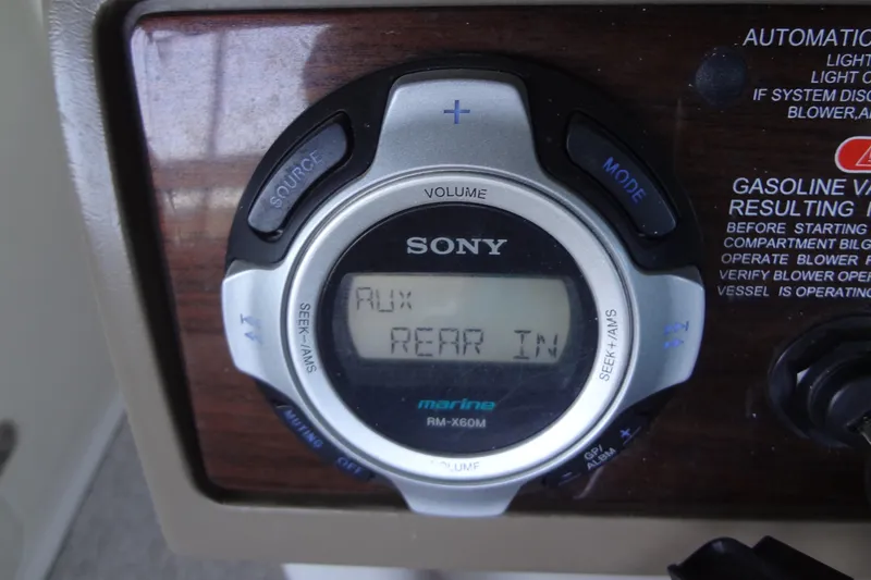 Slide: The Image of Sony marine stereo system on 2010 Sea Ray 260 Sundeck boat dashboard. - 42