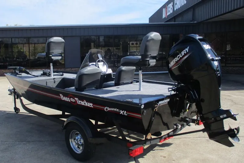 Slide: The Image of 2026 Tracker Bass Tracker Classic XL boat with Mercury engine on trailer. - 3