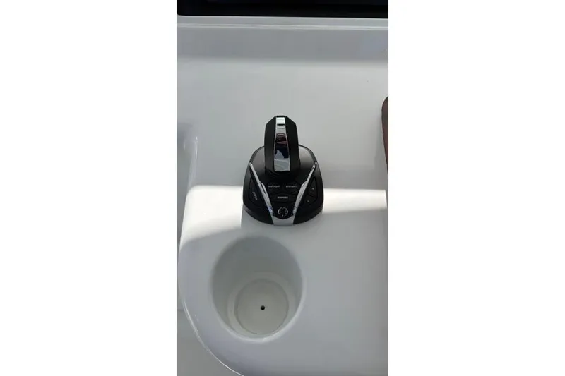 Slide: The Image of Control panel on 2012 Shearline Express Fisherman boat, featuring sleek design and modern controls. - 9