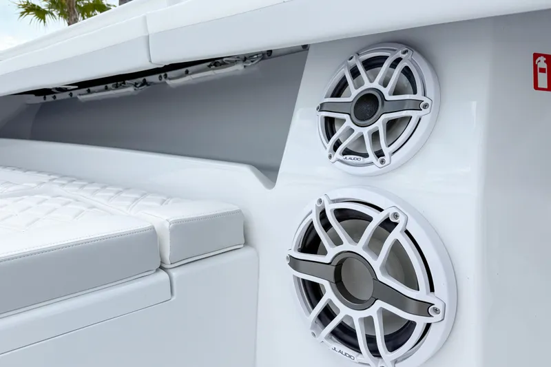 Slide: The Image of 2024 Yellowfin 34 Offshore boat speakers and seating detail. - 20